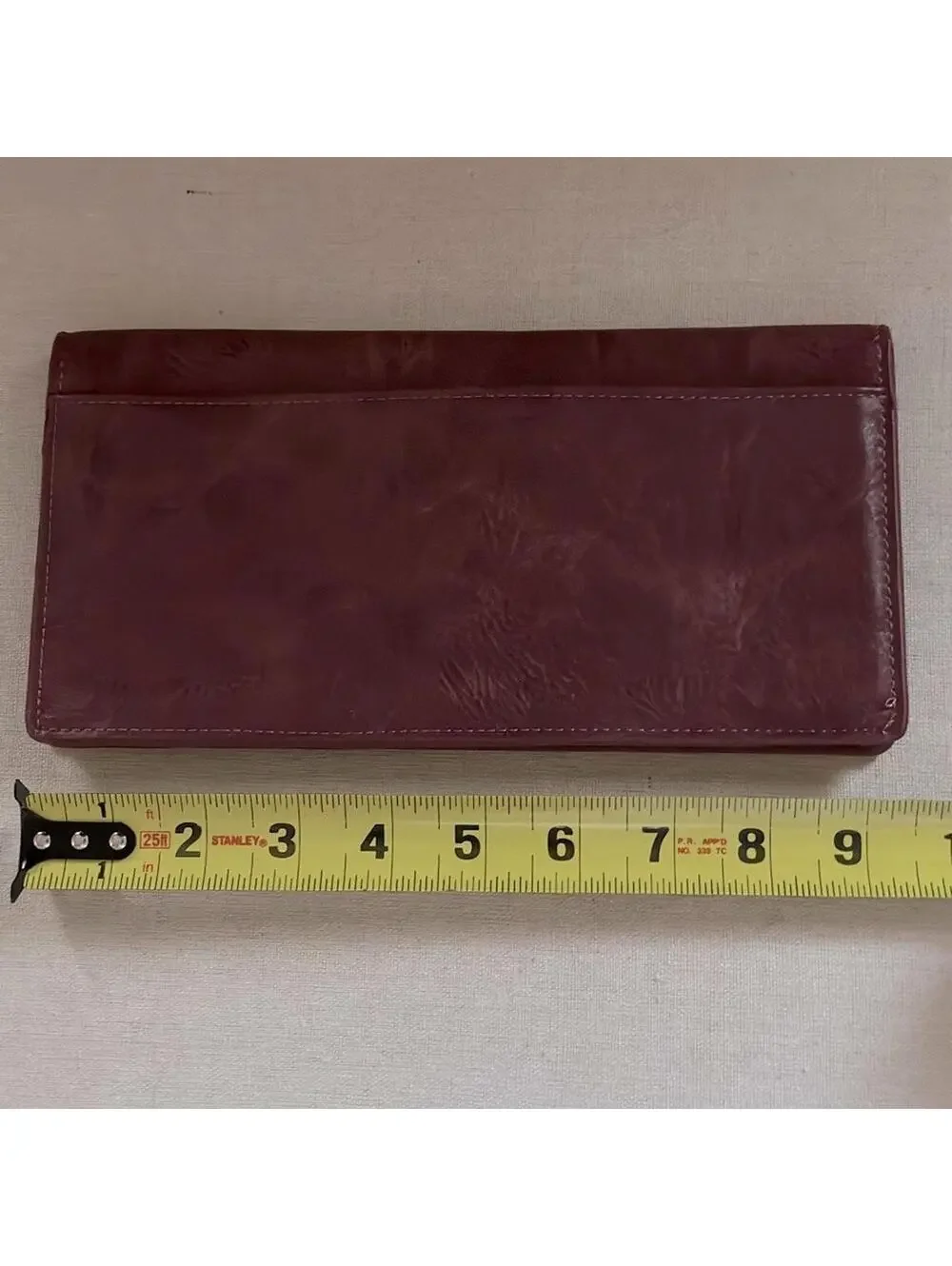 Vintage Wanderlust burgundy leather passport / travel wallet with plaid lining.
